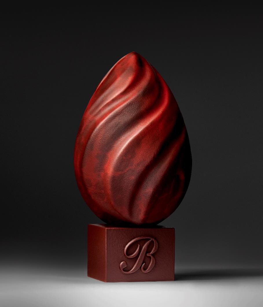 Une image contenant Photographie de nature morte, rouge, chocolat  Description générée automatiquement