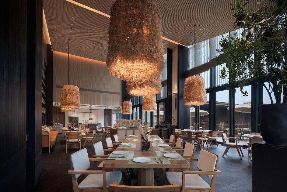 A restaurant with tables and chairs AI-generated content may be incorrect.